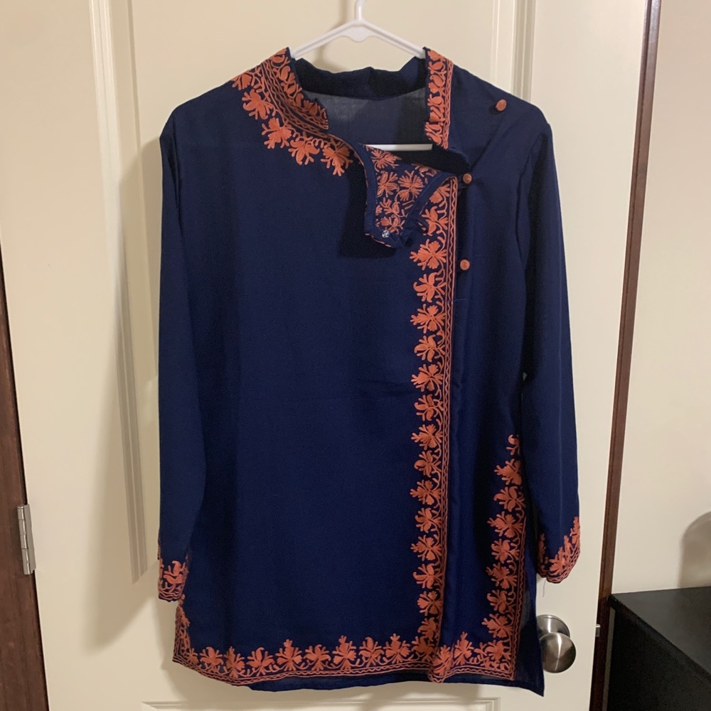 Top with hand embroidery